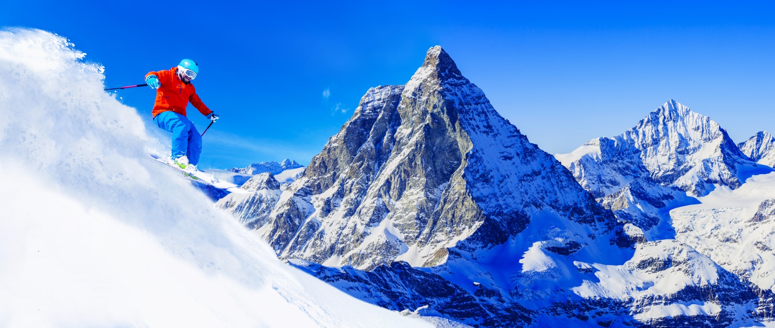 Lyžař u Matterhornu, Zermatt, švýcarské Alpy